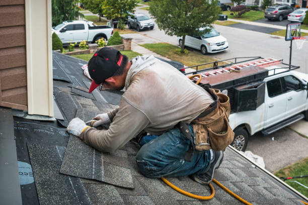 Professional Hail Damage Roof Repair technician working in Claridge, PA